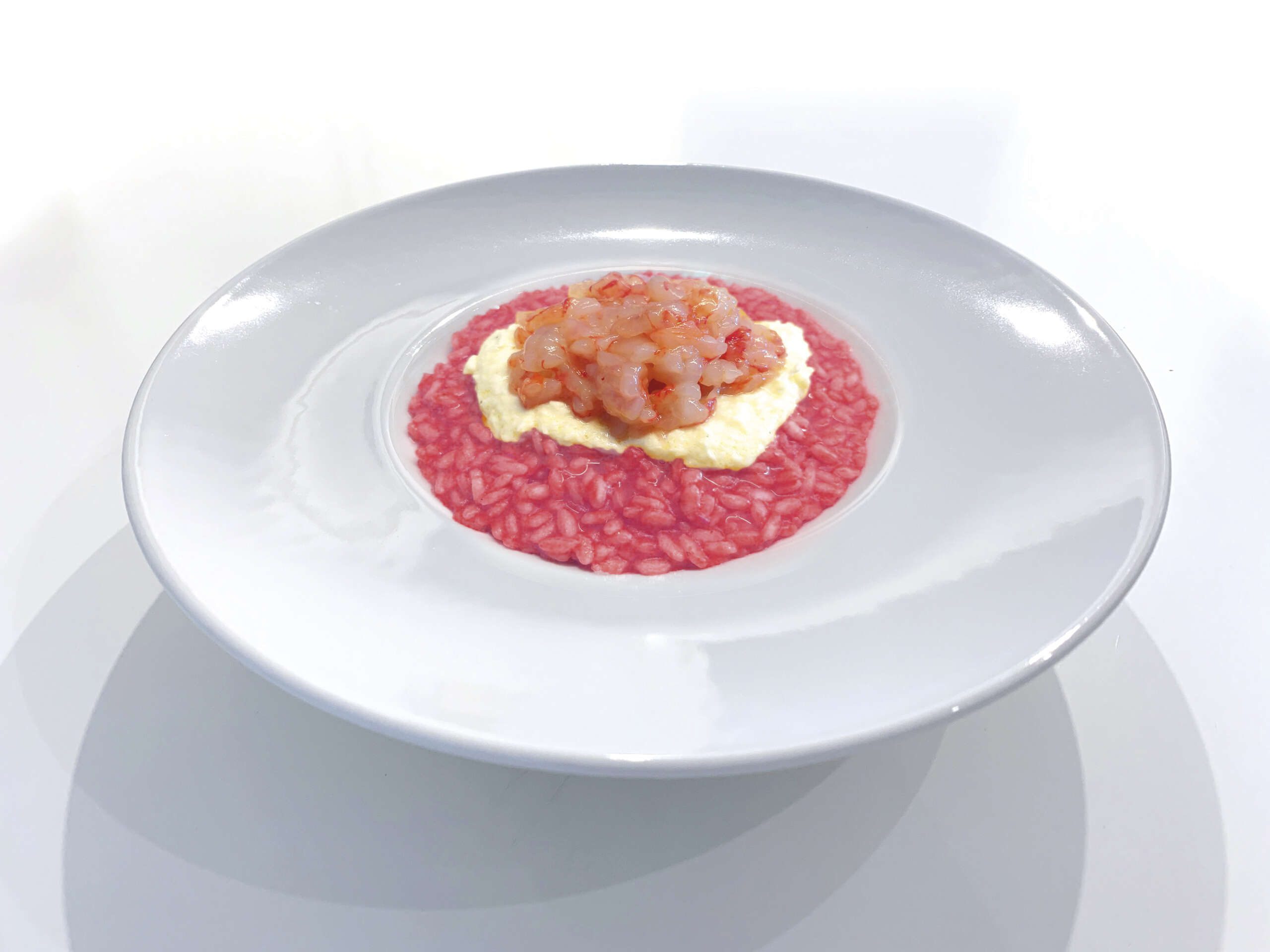 piatto-risotto-rosso-gambero-crudo copia